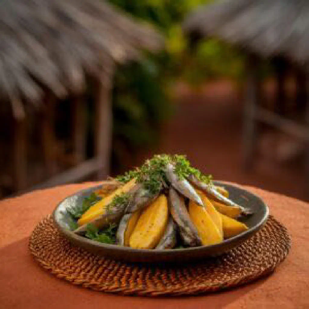 Steamed sweet potato leaves with onion, garlic and tomato
