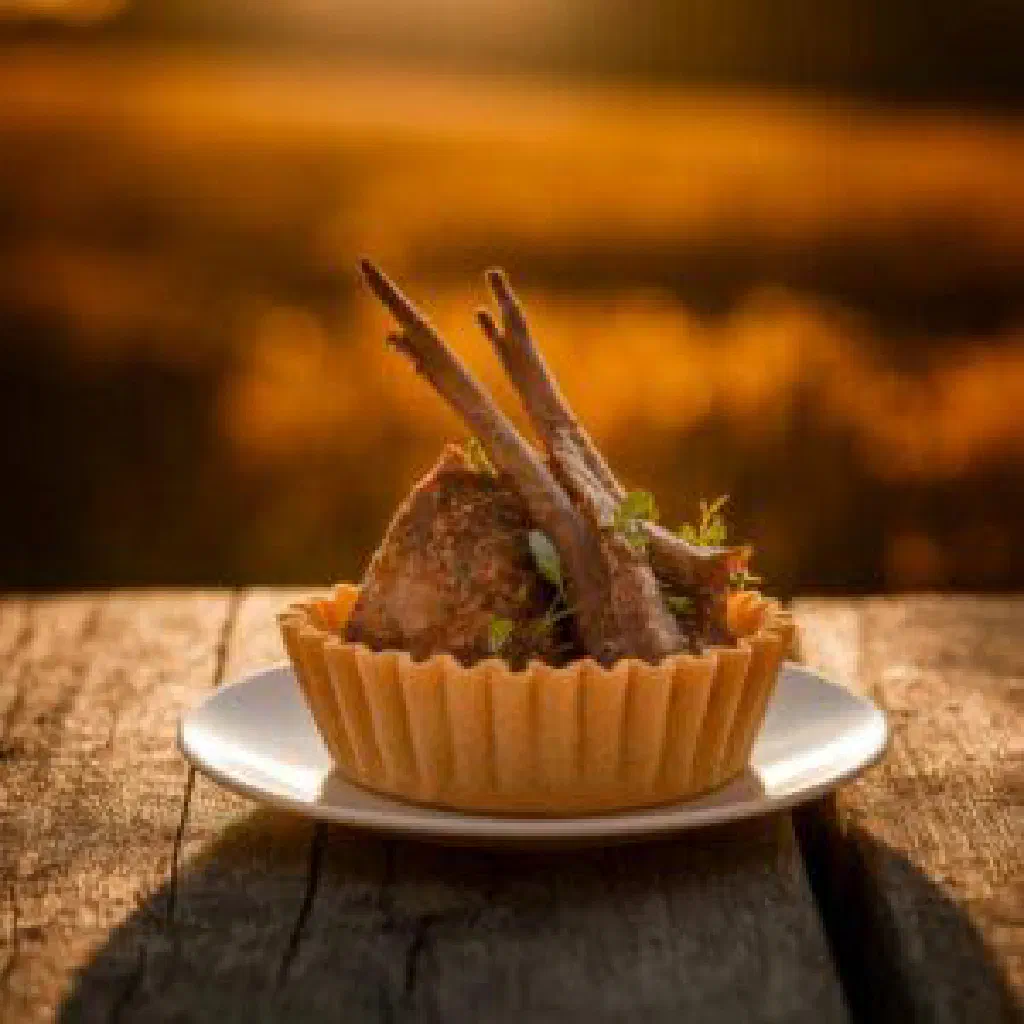 Braised pork with white cabbage and potatoes in a rustic bowl