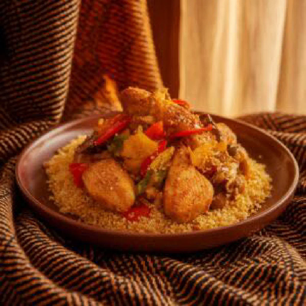 Kossan with tender chicken and colourful sautéed vegetables in a savoury broth