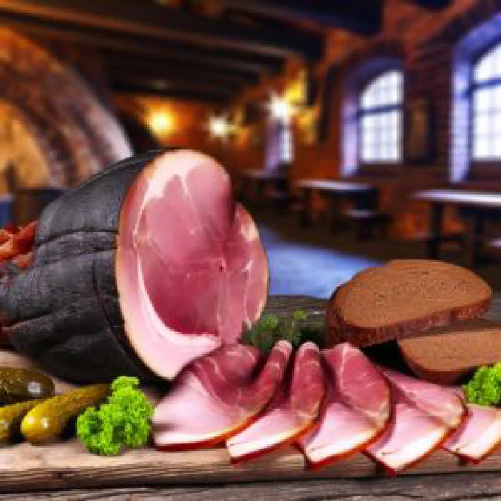 Thin slices of Westphalian bone-in ham served with farmhouse bread and gherkins