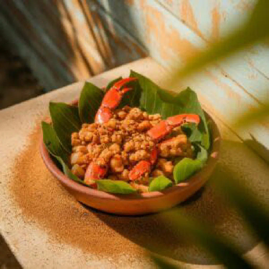 Haitian lalo aux crabes with crab, spinach and creamy peanut sauce