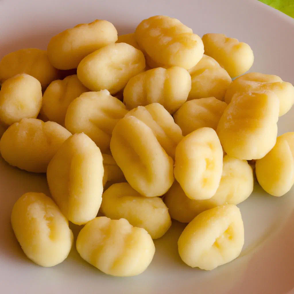 Soft potato gnocchi tossed in butter and sage with grated Parmesan