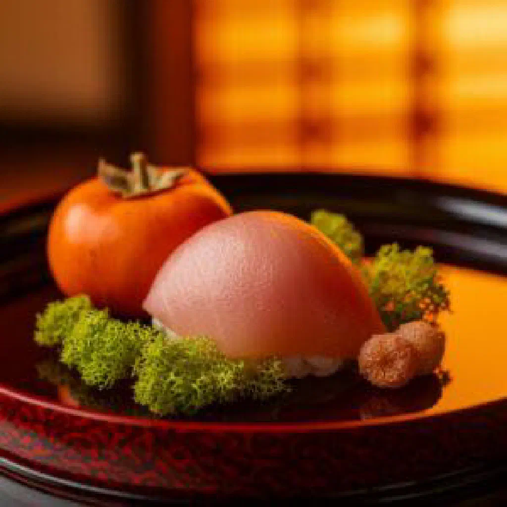Sliced funazushi, fermented carp sushi, served on a plate