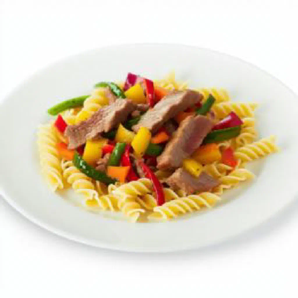Bowl of boso lagman with hand-pulled noodles, tender meat and colourful vegetables