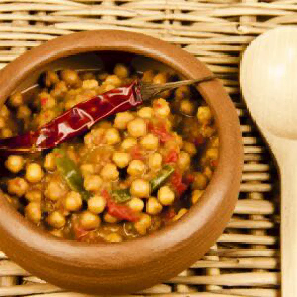 Tsaramaso bean dish with tomatoes and onions served with rice