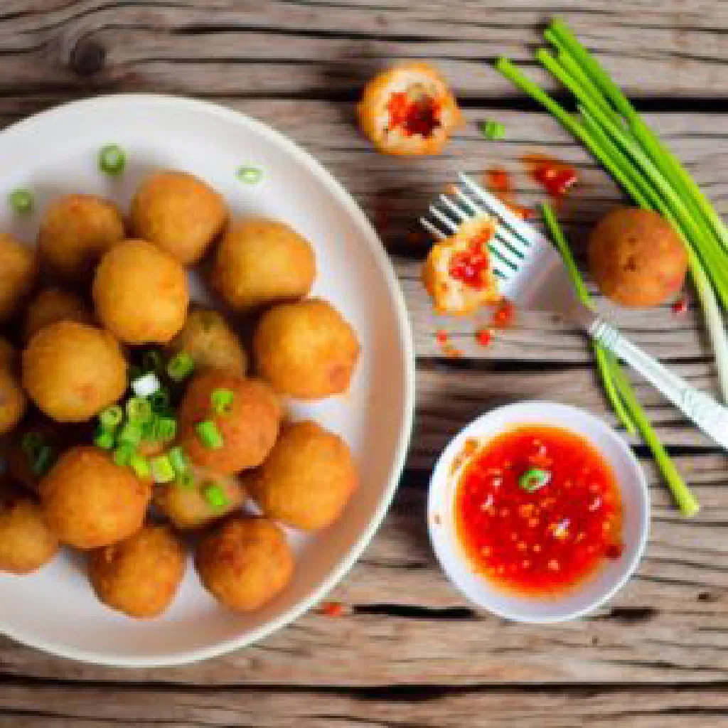 Golden fried gateau piment chilli fritters served warm