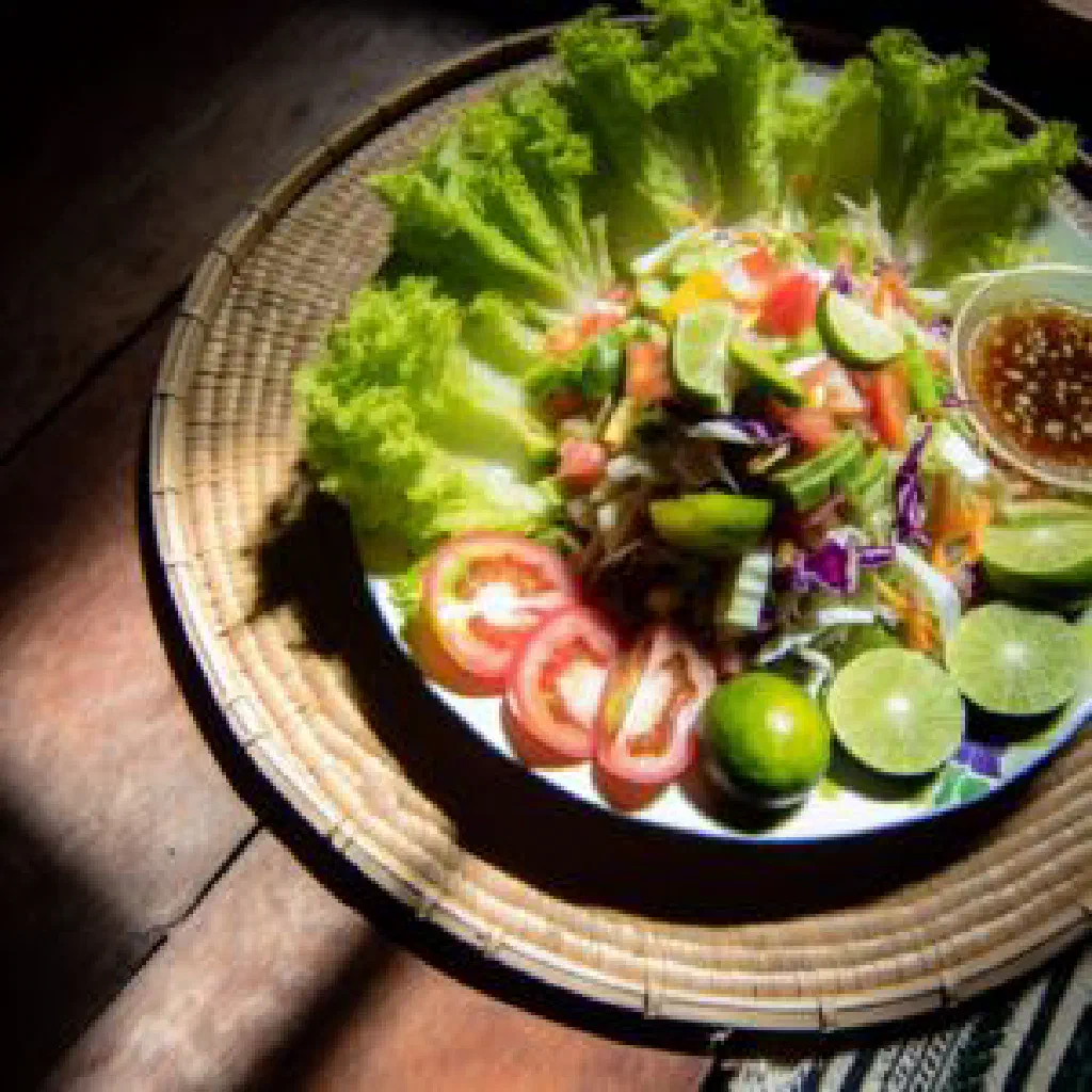 Burmese thoke salad with rice noodles, shredded carrot and peanuts