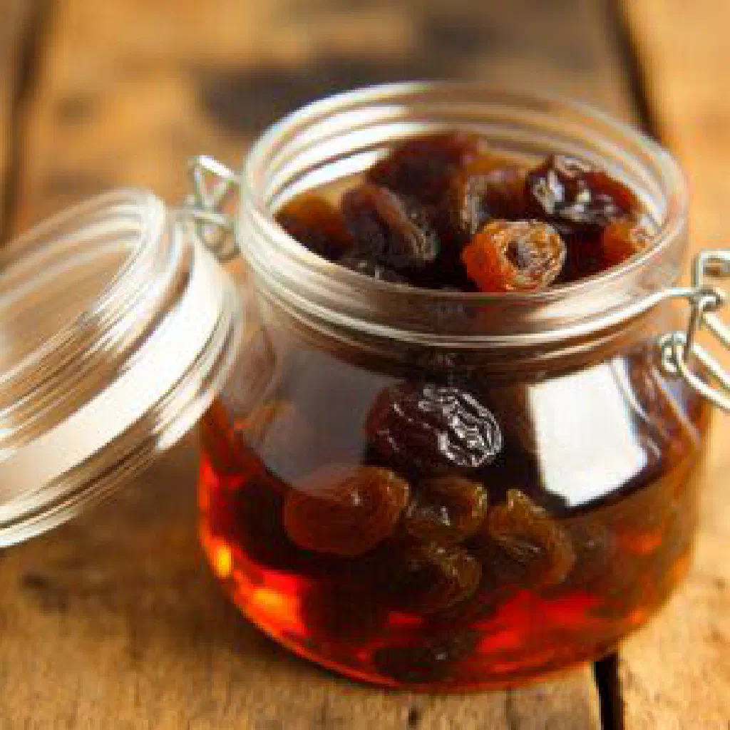 Boerenjongens with brandy-soaked raisins and dried apricots in a small glass