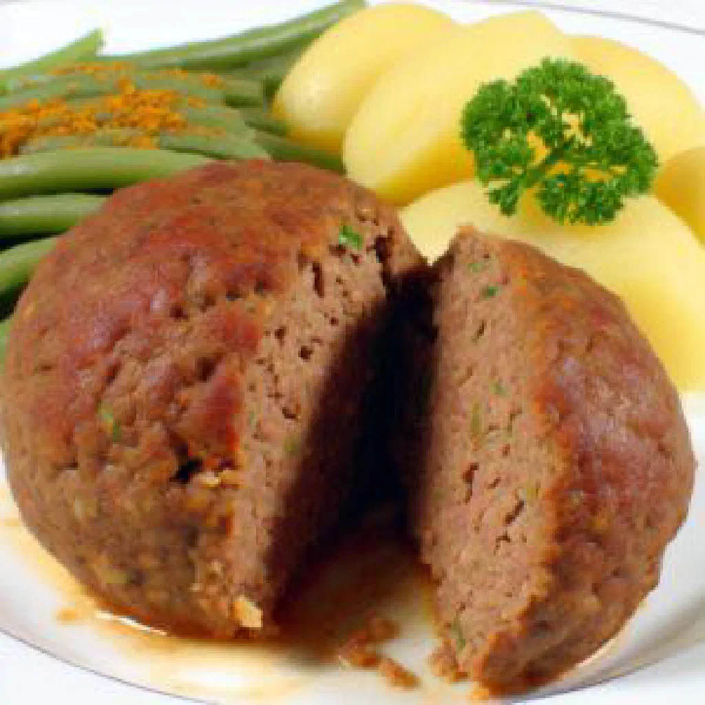 Golden-brown Dutch gehaktbal meatballs served with gravy