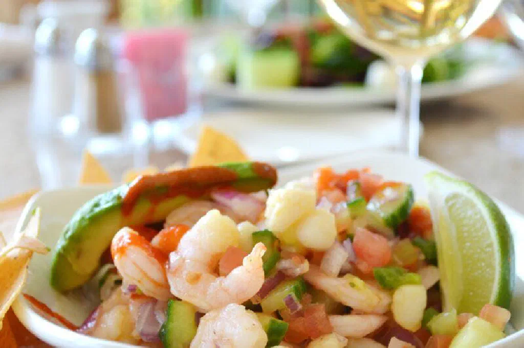 Fresh Peruvian ceviche with fish, red onion, chilli and coriander
