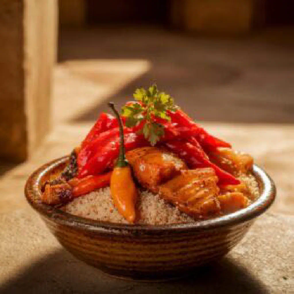 Majarisco with marinated fish, red onion and coriander served with potatoes