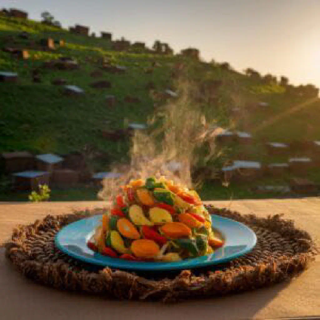 Colourful medley of Rwandan intore vegetables with a peanut dip