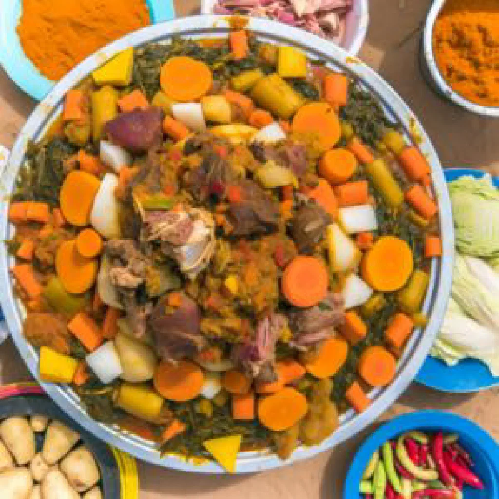 Dakhin with fragrant rice and tender fish garnished with fresh herbs