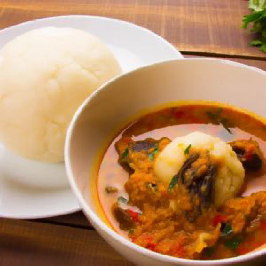 Smooth mound of fufu served with a rich West African stew