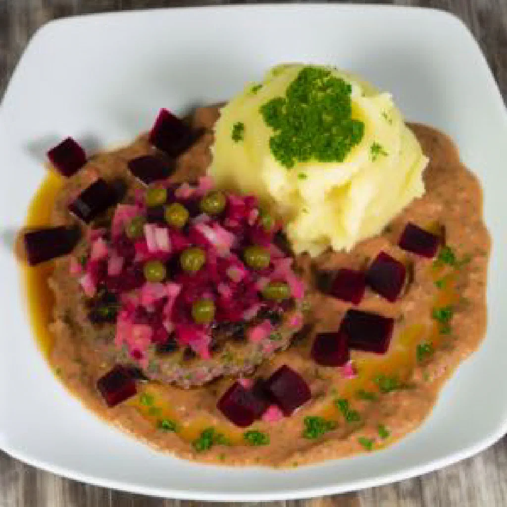 Swedish Biff Lindström beef patties with beetroot served with potatoes