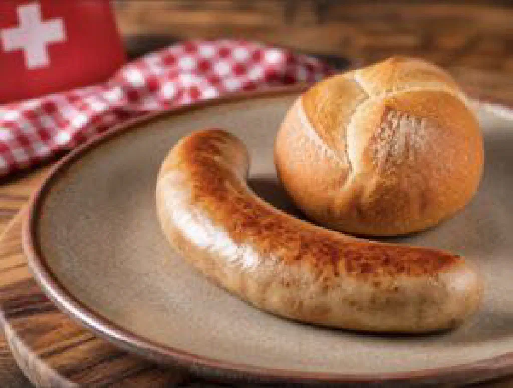 Golden-browned St. Gallen Olma bratwurst served with bread and mustard
