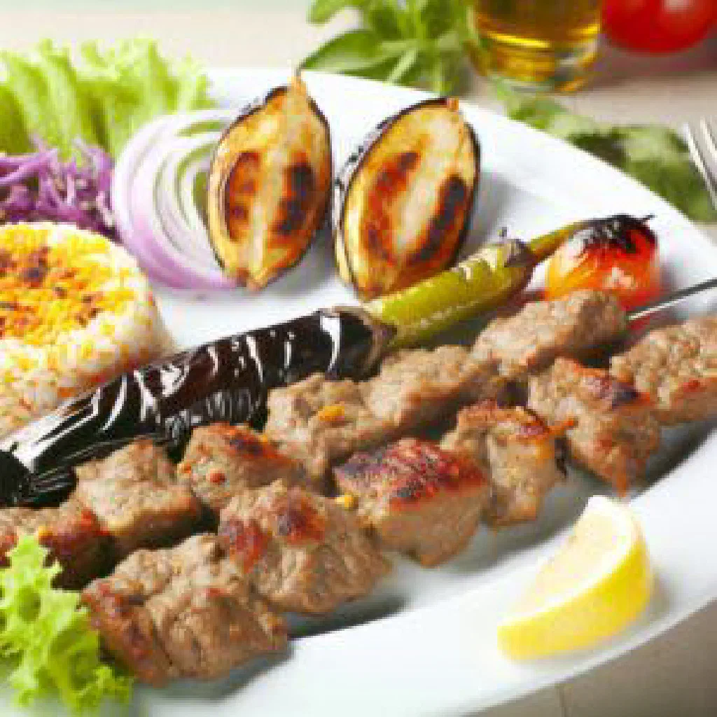 Grilled aubergine kebab layered with spiced minced meat and fresh parsley
