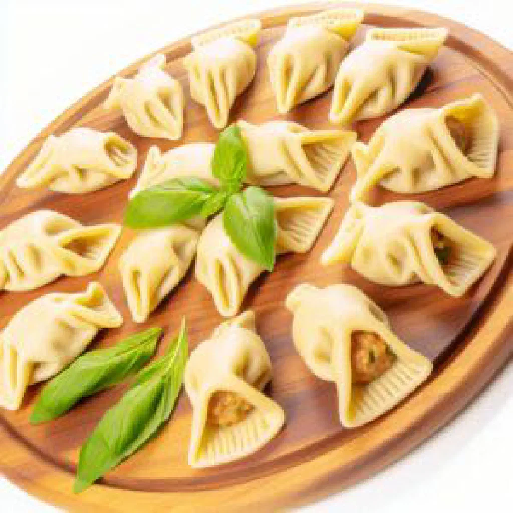 Golden fried Kynar dumplings served with a spicy tomato sauce