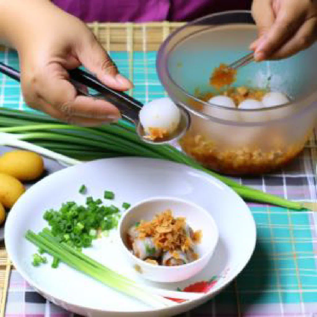 Folded Vietnamese banh xoai pancake with a savoury pork and vegetable filling