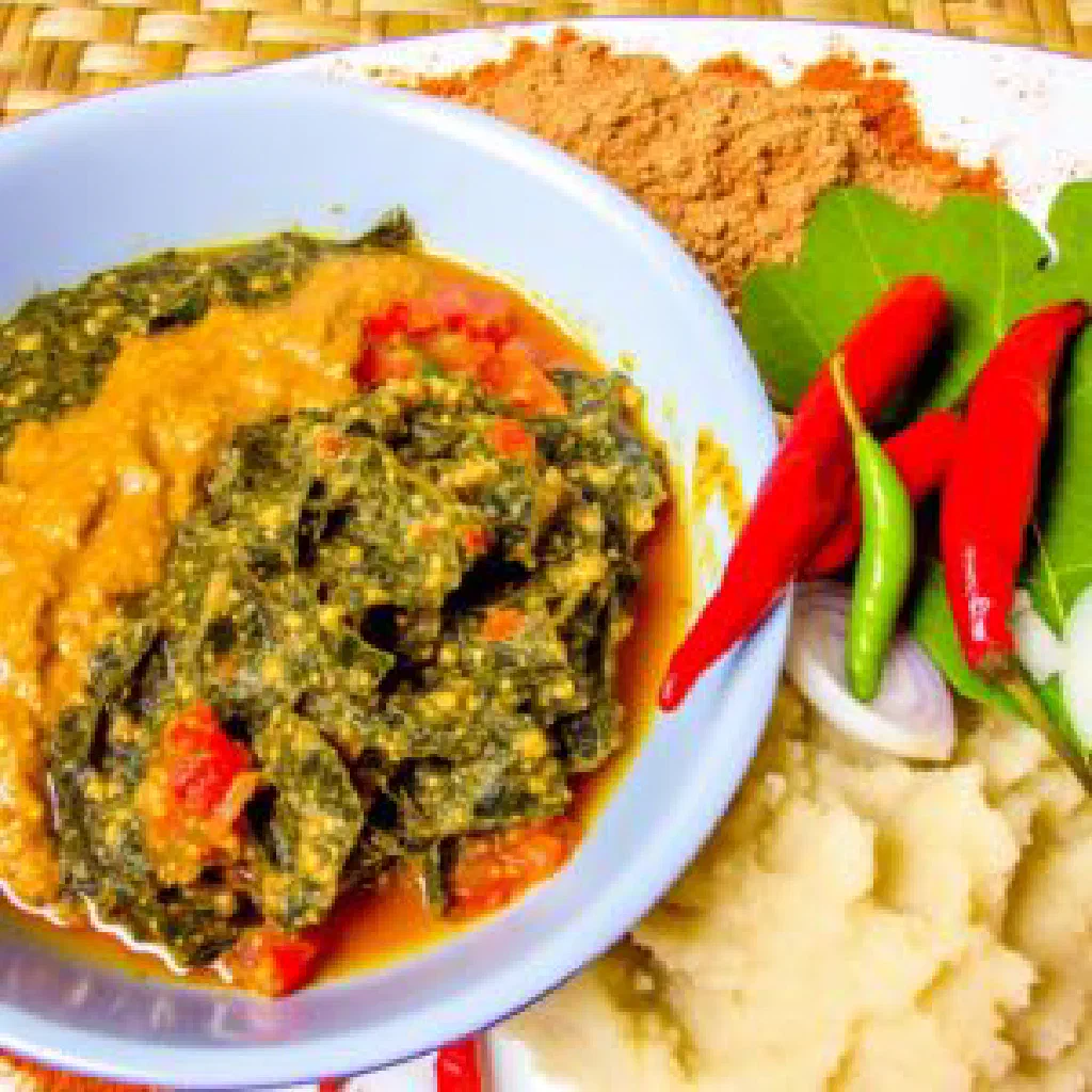 Bowl of nyevhe, a creamy sweet potato and spinach mash from Zimbabwe
